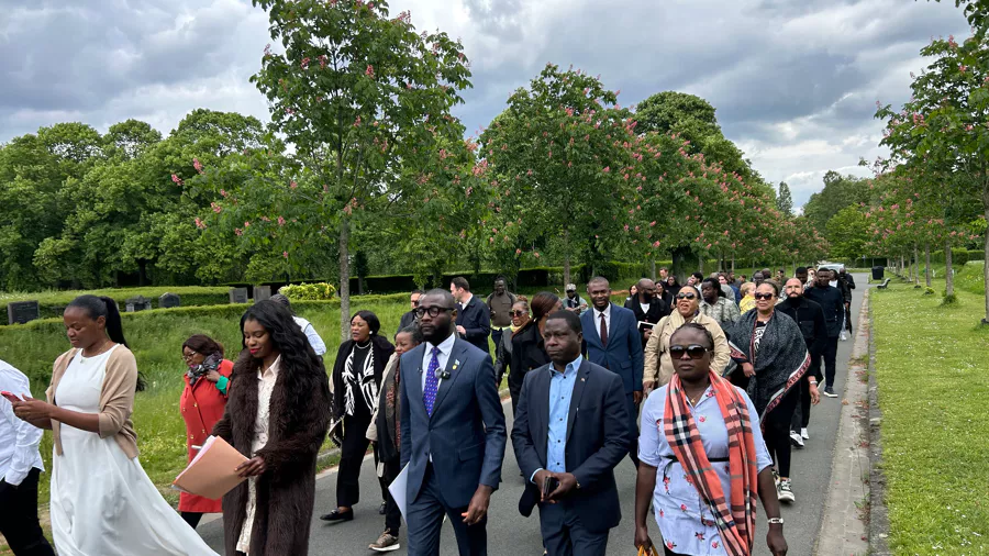 Members walking together at a burial